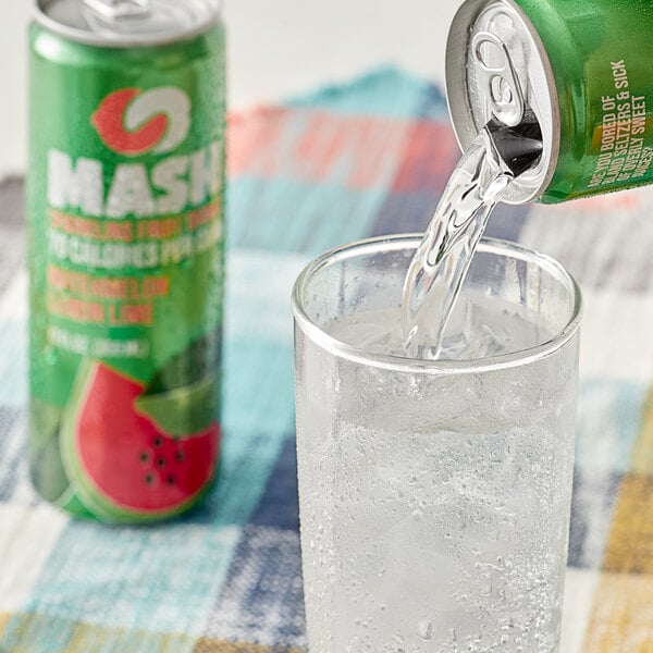 A Boylan Mash Watermelon Lemon Lime soda can pouring into a glass of ice.