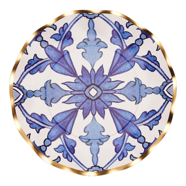 A Sophistiplate paper salad plate with a blue and white Moroccan design and gold rim.