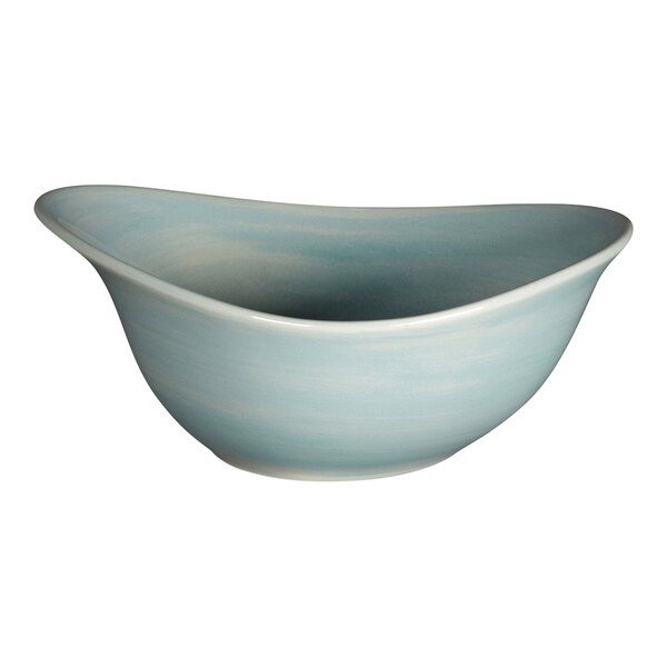 A close-up of a blue bowl with a white rim.