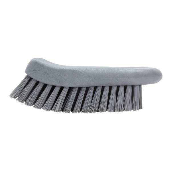 A close up of a grey Carlisle Sparta handheld scrub brush with a white handle.