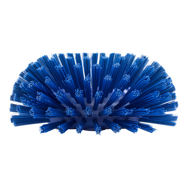 A close-up of a Carlisle blue tank and kettle brush with polyester bristles.