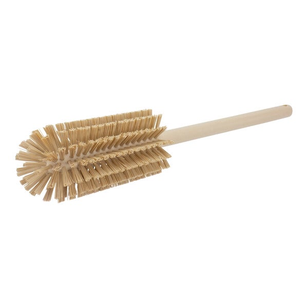 A Carlisle tan bottle cleaning brush with a black handle and white bristles.