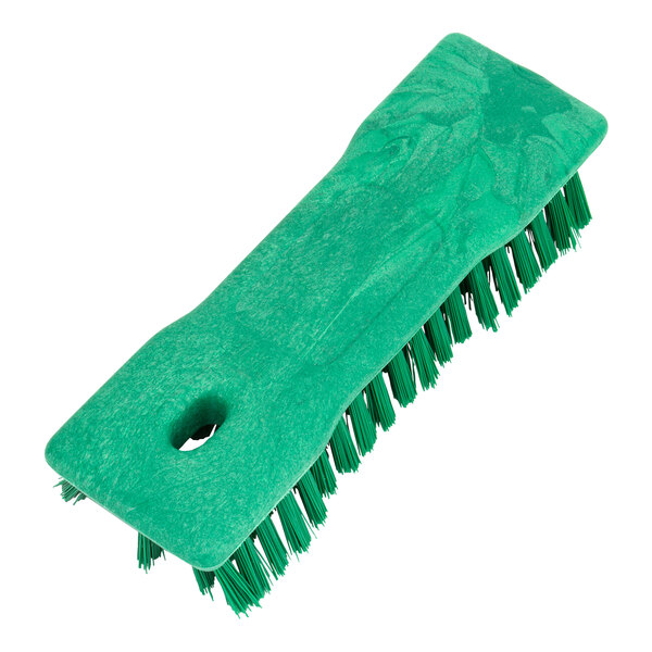 A green Carlisle Sparta handheld comfort grip scrub brush with bristles.