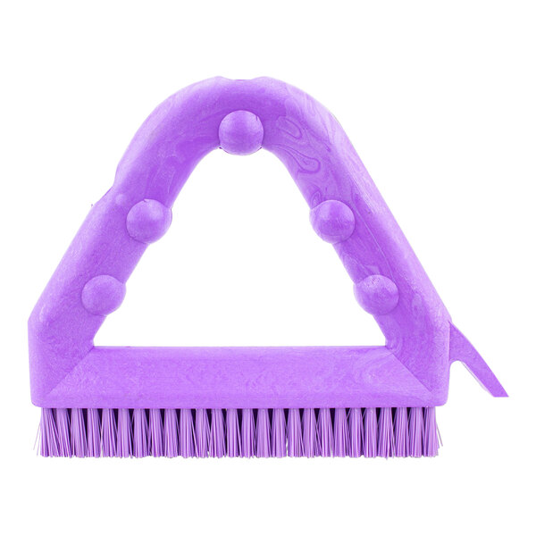 A purple plastic triangle shaped Carlisle Sparta Spectrum grout brush.