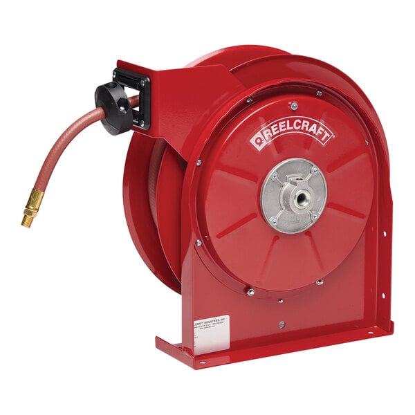 A red Reelcraft Series 5005 hose reel with a hose attached.