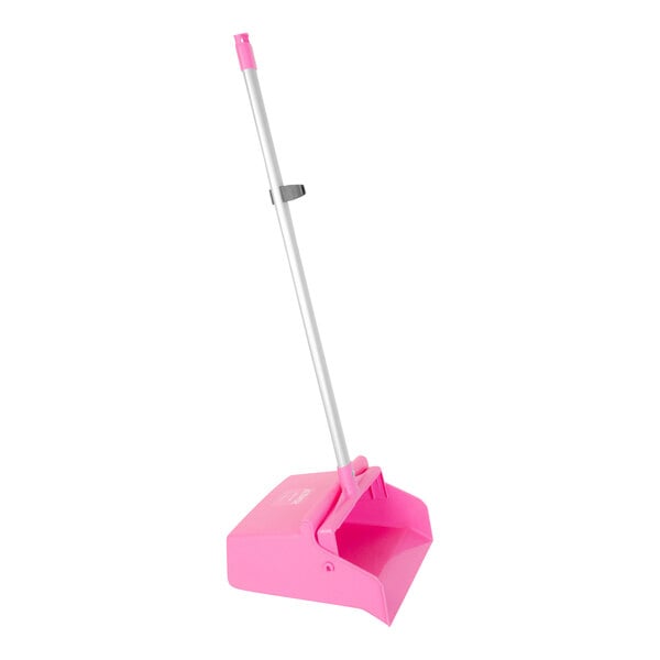 A pink dustpan with a long aluminum handle.