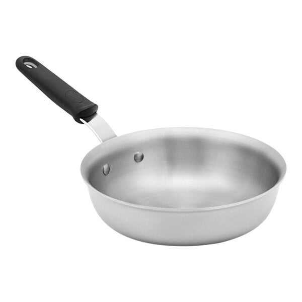 A Vollrath stainless steel saucier pan with a black handle.
