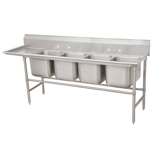 A stainless steel Advance Tabco four compartment pot sink with left drainboard.