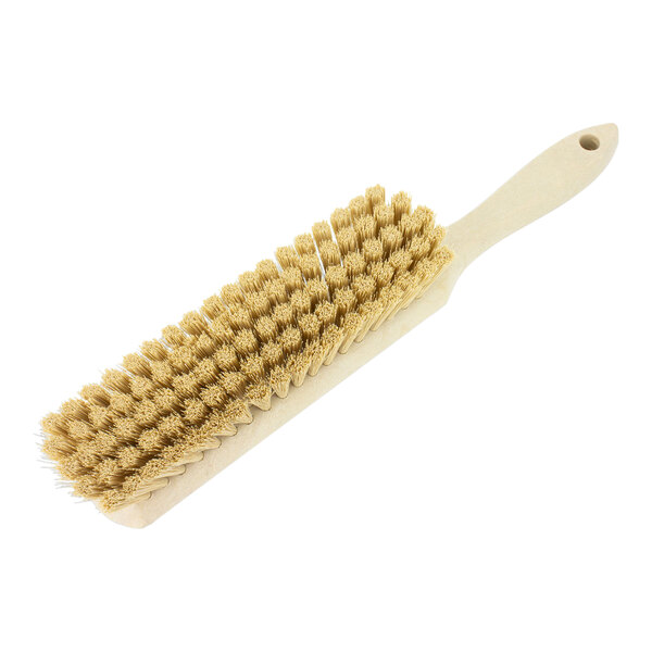 A Carlisle tan soft polyester counter brush with bristles.