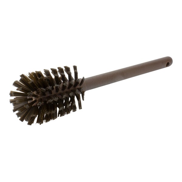 A close-up of a Carlisle brown bottle cleaning brush with a handle.