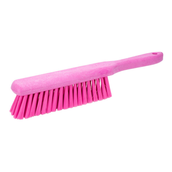 A Carlisle Sparta pink counter brush with long bristles.