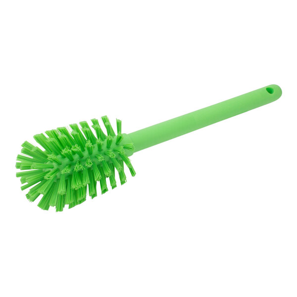 A green Carlisle Sparta bottle cleaning brush with bristles.