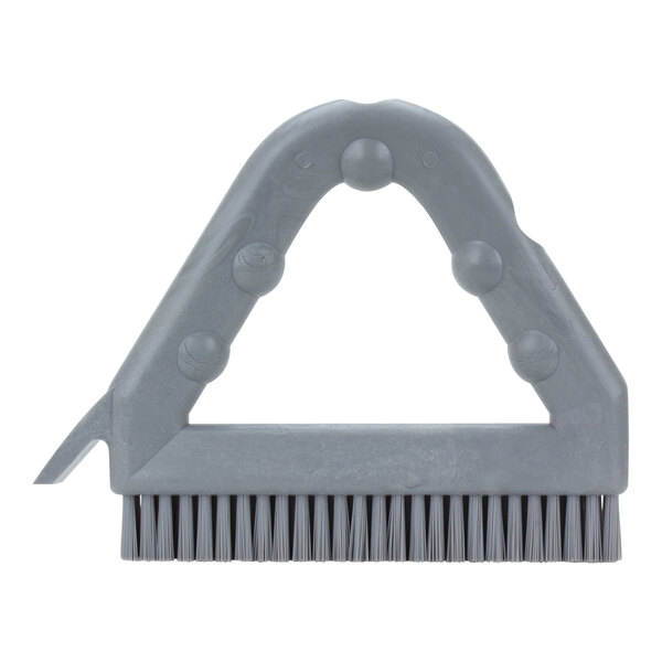 A grey plastic Carlisle Sparta Spectrum grout brush with bristles.