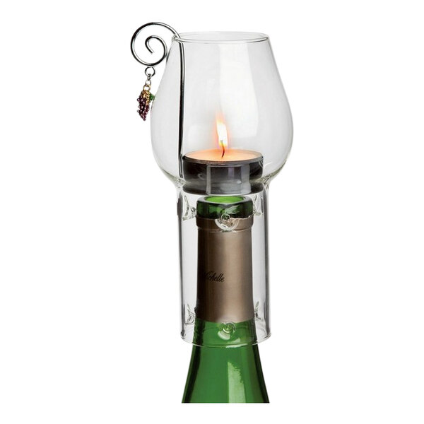A Franmara wine chimney candle holder with a candle inside a wine bottle.