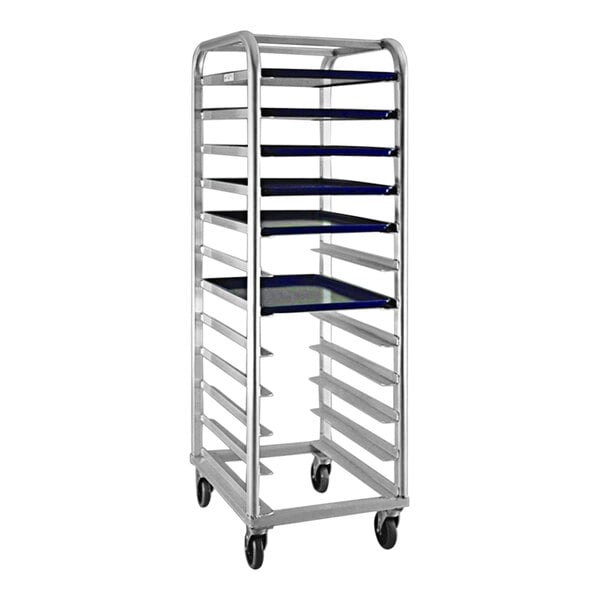 A metal rack with blue shelves holding aluminum platters.