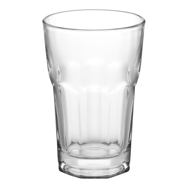 An Acopa Memphis highball glass with a clear bottom.