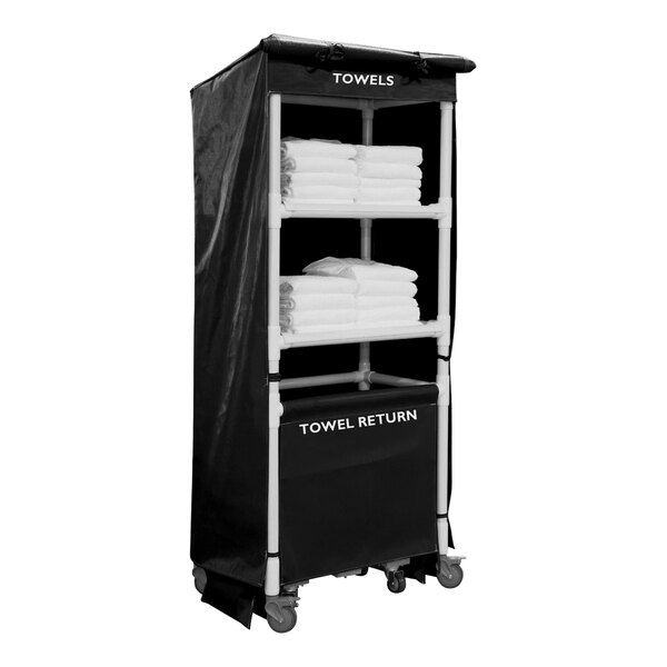 A black laundry cart with white towels on it.