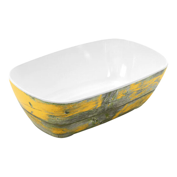 A white and yellow Dalebrook by BauscherHepp Tura melamine crock with a yellow rim.