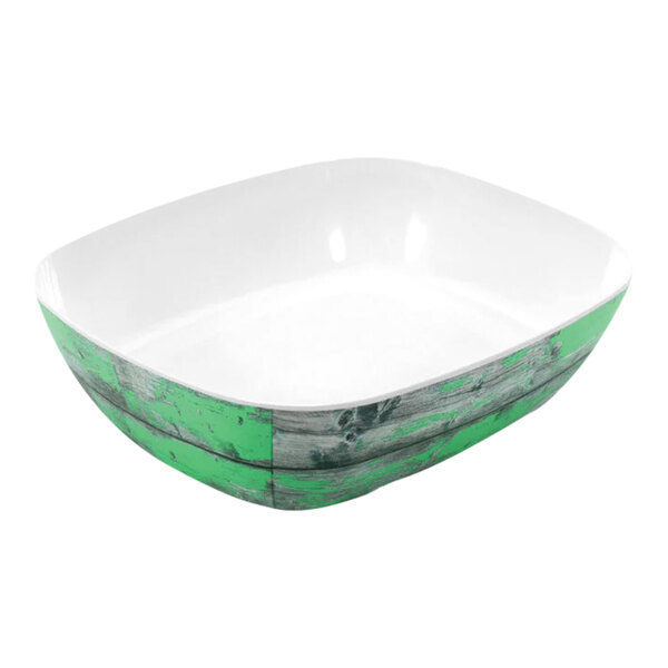 A white and teal melamine crock with a rustic design.