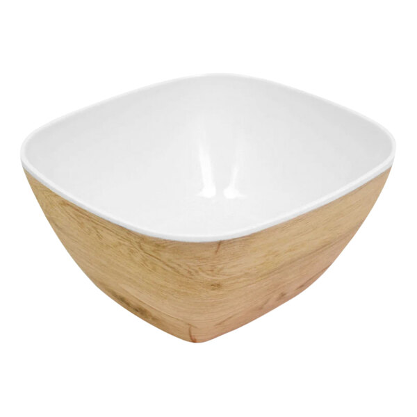A white melamine crock with a wood design on the rim.