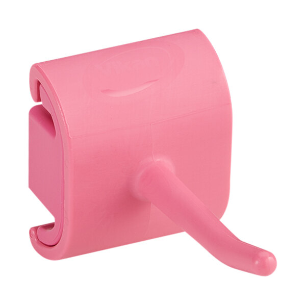 A pink plastic Vikan wall bracket with a hook.