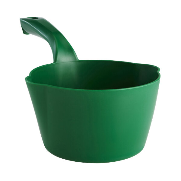 A green plastic scoop with a handle.