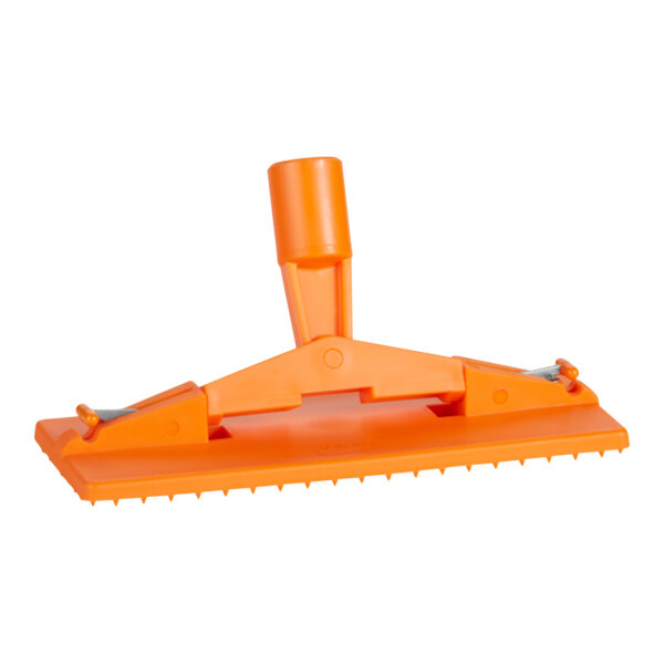 An orange plastic Vikan scrub pad holder.
