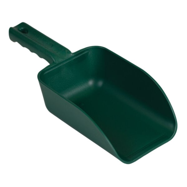 A green plastic Remco hand scoop with a handle.