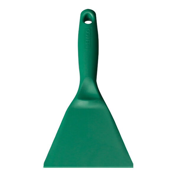 A close-up of a green Remco metal detectable hand scraper with a handle.