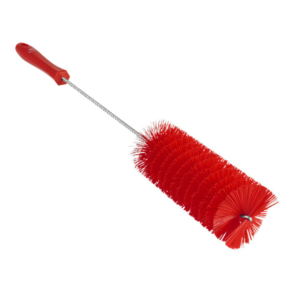 A red Vikan tube brush with long bristles and a long handle.