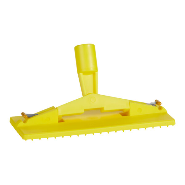 A yellow plastic Vikan scrub pad holder.