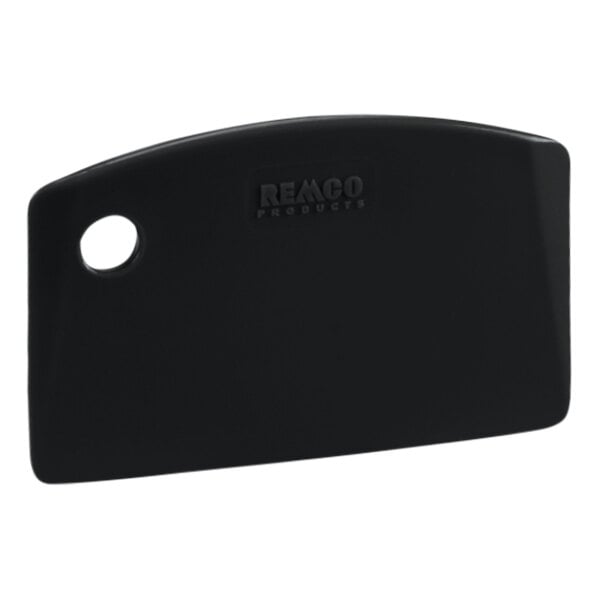 A black Remco bench scraper with a white circle on it.