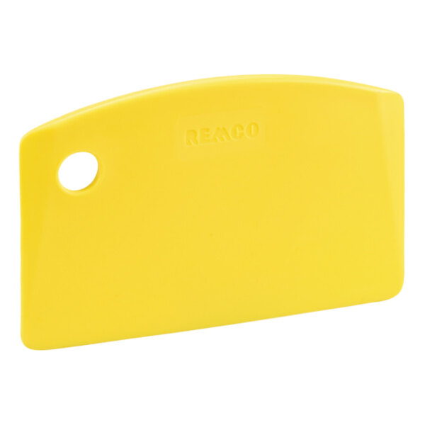 A yellow plastic Remco mini bench scraper with a hole in it.