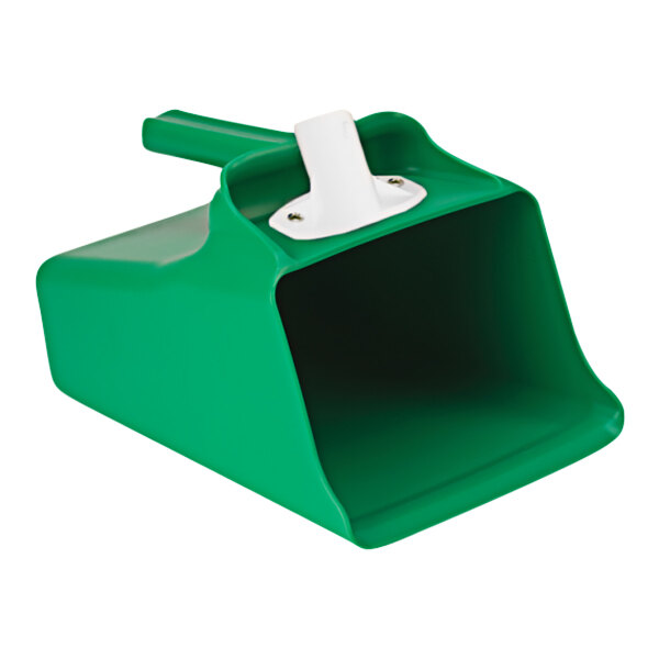 A green plastic Remco Mega Dipper with a white handle.
