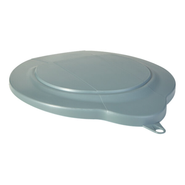 A gray plastic lid for a bucket with a circular hole.