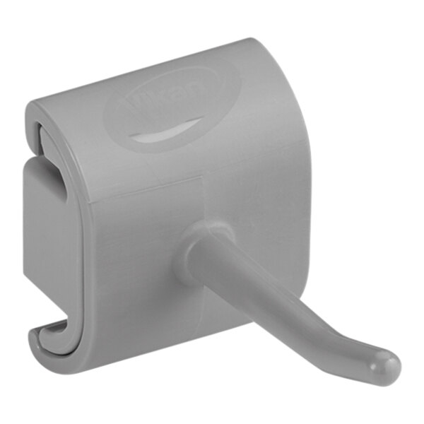 A grey plastic Vikan wall hook with a handle.