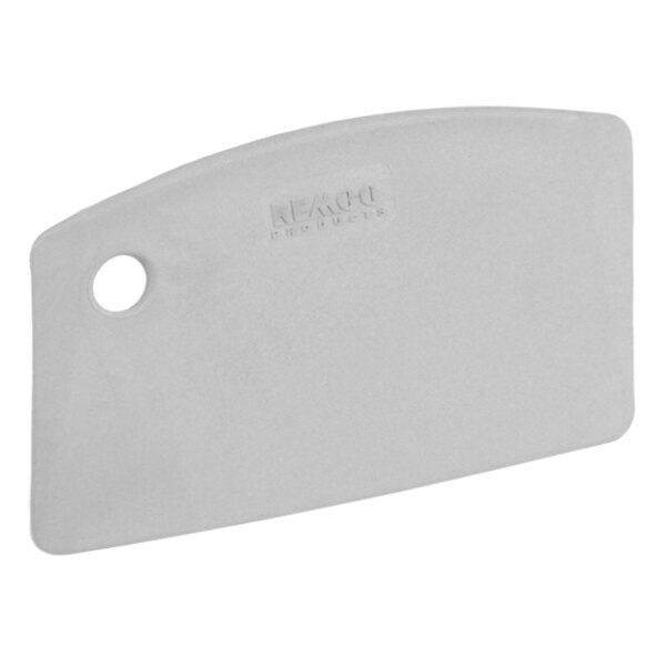 A white plastic cutting board with a hole being scraped by a gray Remco metal detectable mini bench scraper.