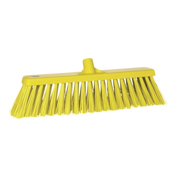 A yellow Vikan push broom head with long bristles.