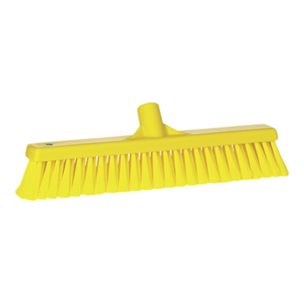A yellow broom head with soft / split bristles.