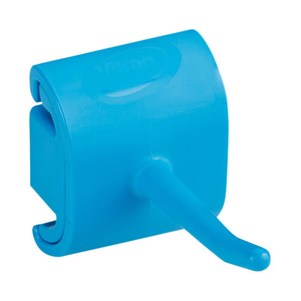 A blue plastic Vikan wall bracket with a hook.