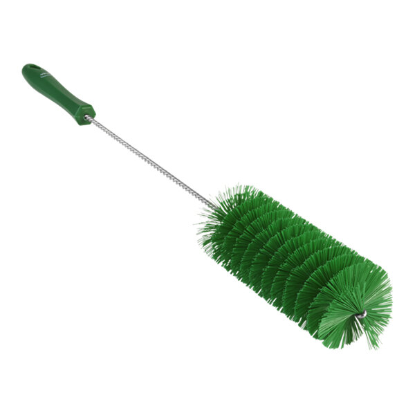 A Vikan green tube brush with a green handle.