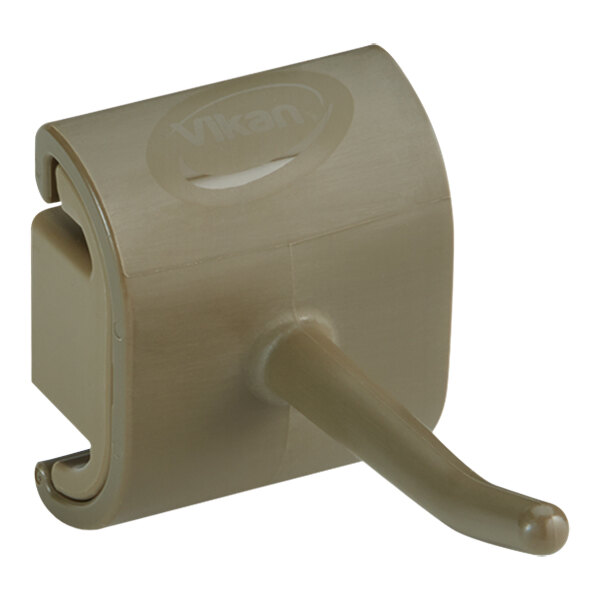 A brown plastic wall bracket with a hook.
