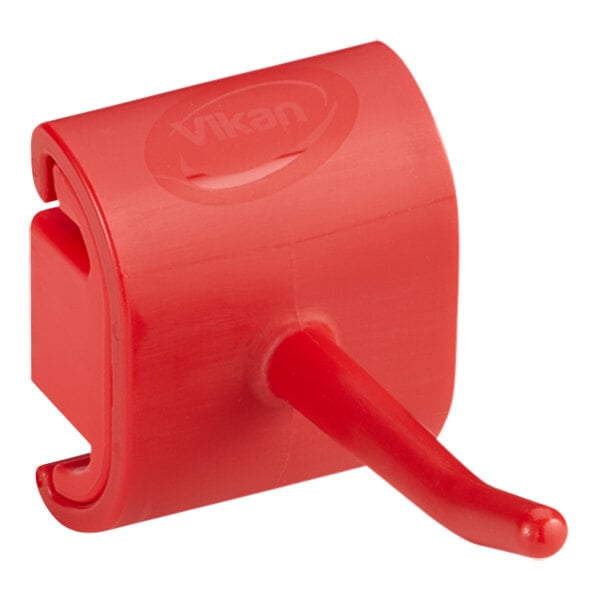 A red Vikan plastic hook with a handle.