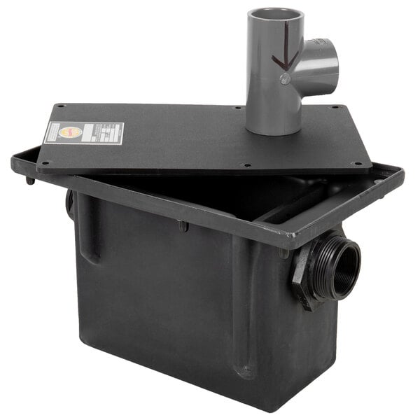 A black rectangular Zurn grease trap with pipe connections.