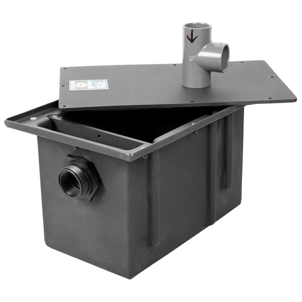 A black rectangular Zurn polyethylene grease trap with pipe connections.
