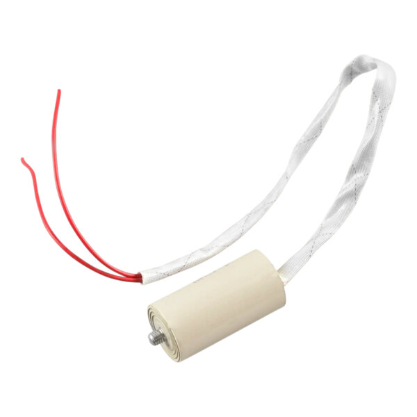 A white CRB Cleaning Systems E51 run capacitor with red wires.