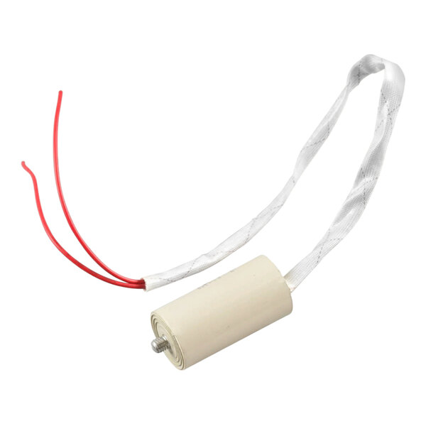 A white CRB Cleaning Systems run capacitor with red wires.