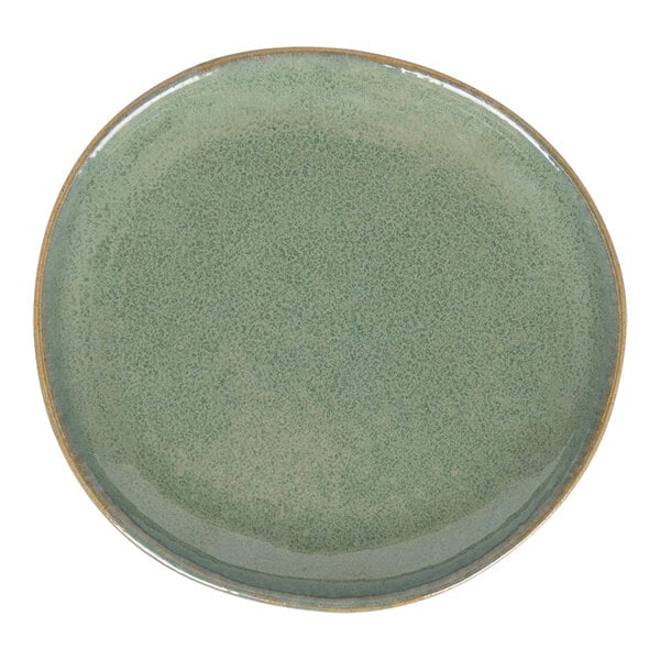 A Front of the House Artefact green porcelain plate with a brown rim.