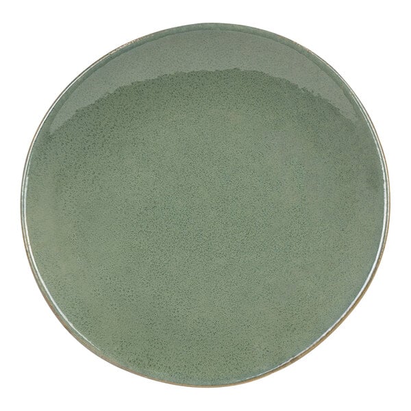 A Front of the House Artefact moss porcelain bowl with a green surface and white border.
