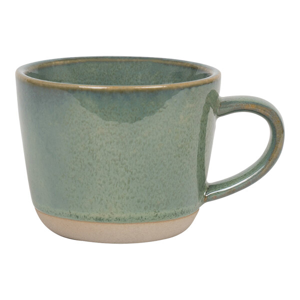 A Front of the House Artefact moss porcelain mug with a white rim and handle.